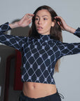 POLERA TINI MONOGRAM - BLACK