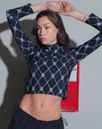 POLERA TINI MONOGRAM - BLACK