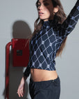 POLERA TINI MONOGRAM - BLACK