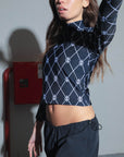 POLERA TINI MONOGRAM - BLACK